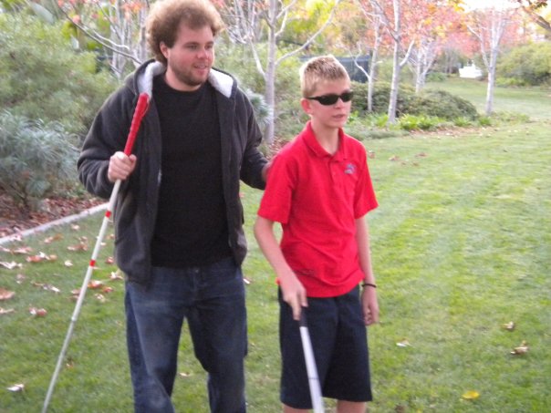 Jake works with our Mobility Coach, Brian Bushway, on FlashSonar and long-cane training.